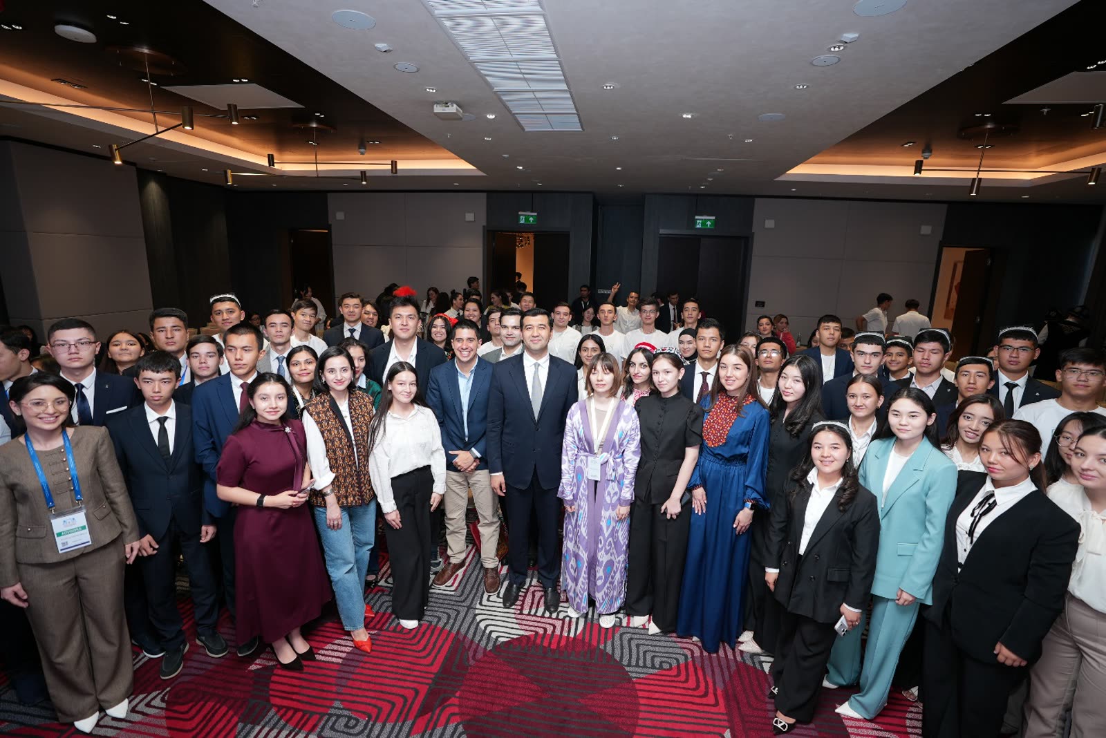 Young participants and the World Youth Office team gathered at a platform event.